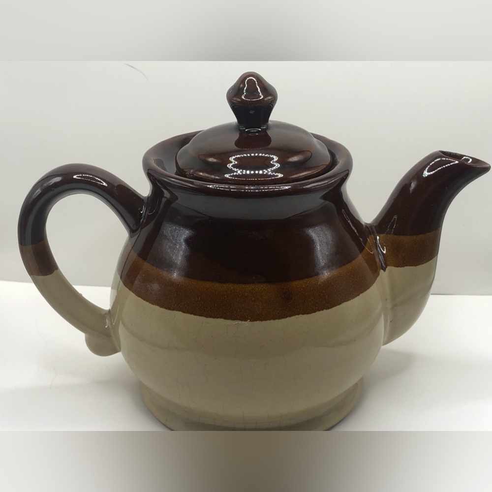 Vintage stoneware pottery teapot in grown and tan. Imperfect but good condition